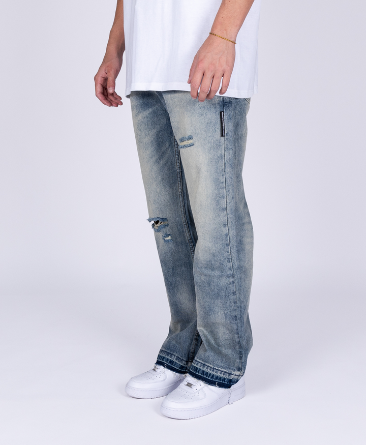 DESTROYED FLARED JEANS