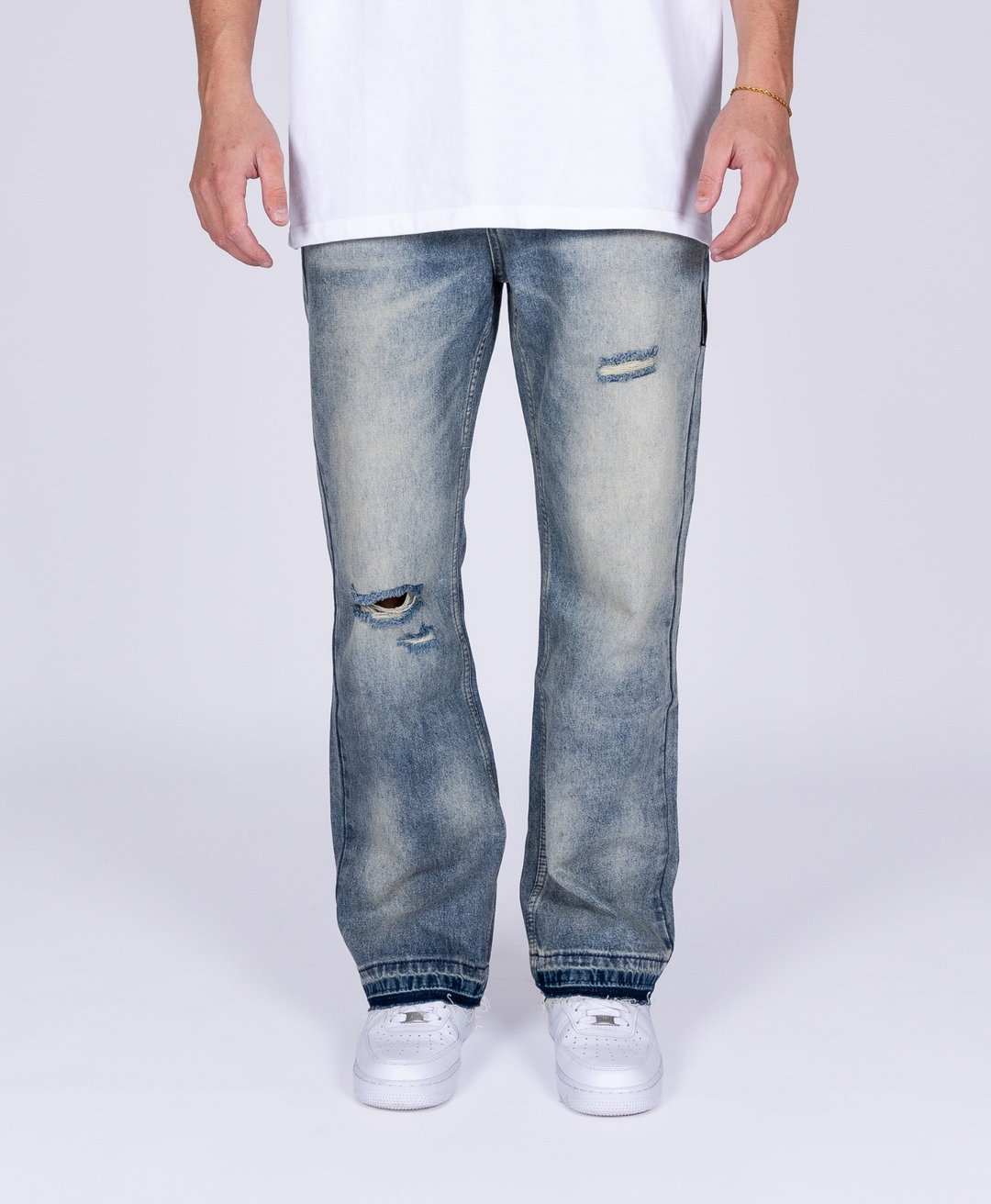 DESTROYED FLARED JEANS